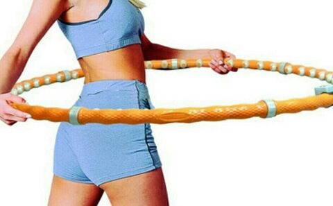 Exercises with a hoop to lose weight in the abdomen and sides